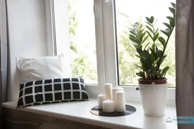 Łóżko lub łóżka w pokoju w obiekcie Warsaw Concierge Bracka Retro flat