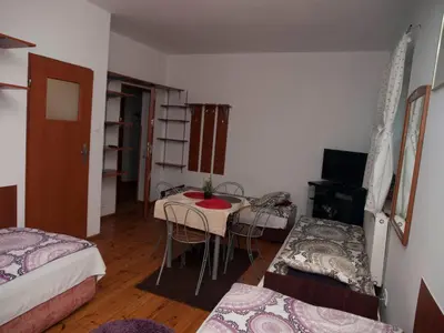 Łóżko lub łóżka w pokoju w obiekcie Pokoje Gościnne 