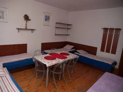 Łóżko lub łóżka w pokoju w obiekcie Pokoje Gościnne 