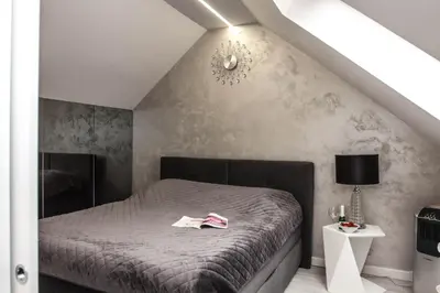 Łóżko lub łóżka w pokoju w obiekcie Apartament MnW