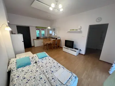 Łóżko lub łóżka w pokoju w obiekcie Sosnowy apartament