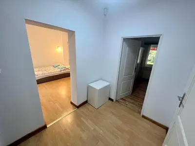 Łóżko lub łóżka w pokoju w obiekcie Sosnowy apartament