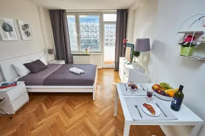 Łóżko lub łóżka w pokoju w obiekcie Noctis City Center IV