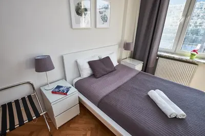 Łóżko lub łóżka w pokoju w obiekcie Noctis City Center IV