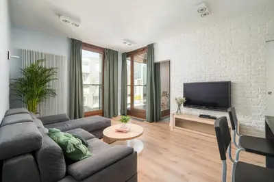 Telewizja i/lub zestaw kina domowego w obiekcie ApartHotel Kolejowa Apartamenty