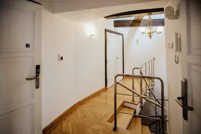 Łóżko lub łóżka w pokoju w obiekcie Green Wood Apartament Stara Ochota