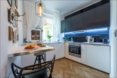 Kuchnia lub aneks kuchenny w obiekcie Poznańska P&O Apartments