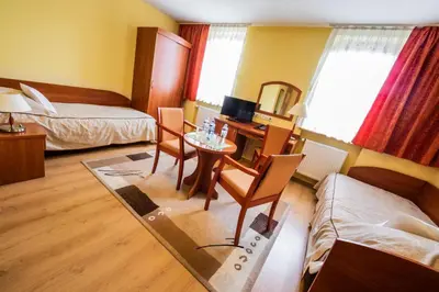 Łóżko lub łóżka w pokoju w obiekcie Hotel Wald