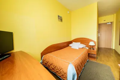 Łóżko lub łóżka w pokoju w obiekcie Hotel Wald
