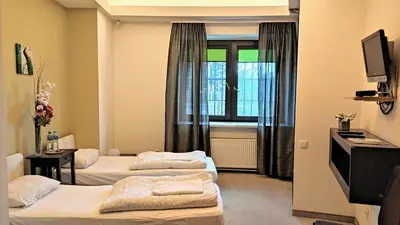 Łóżko lub łóżka w pokoju w obiekcie Helvetia Plus B&B - PRIVATE ROOMS and APARTMENTS