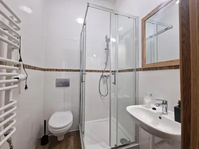 Łazienka w obiekcie Helvetia Plus B&B - PRIVATE ROOMS and APARTMENTS