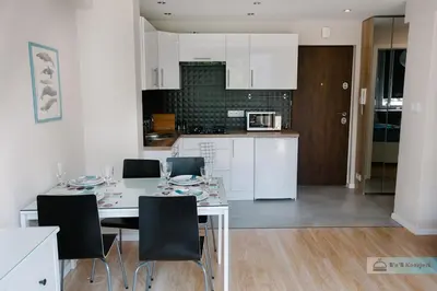 Kuchnia lub aneks kuchenny w obiekcie Warsaw Concierge Polin Apartment