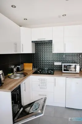 Kuchnia lub aneks kuchenny w obiekcie Warsaw Concierge Polin Apartment