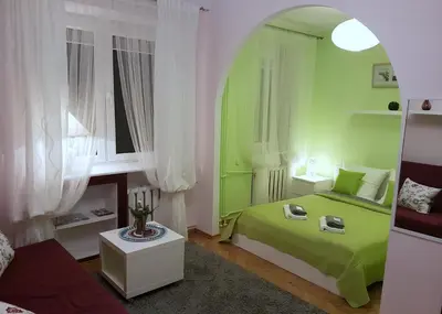 Łóżko lub łóżka w pokoju w obiekcie A.G - Apartamenty Warsaw Center