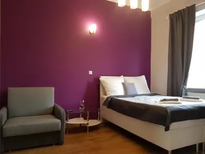 Łóżko lub łóżka w pokoju w obiekcie A.G - Apartamenty Warsaw Center