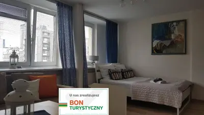 Łóżko lub łóżka w pokoju w obiekcie A.G - Apartamenty Warsaw Center