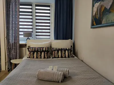 Łóżko lub łóżka w pokoju w obiekcie A.G - Apartamenty Warsaw Center