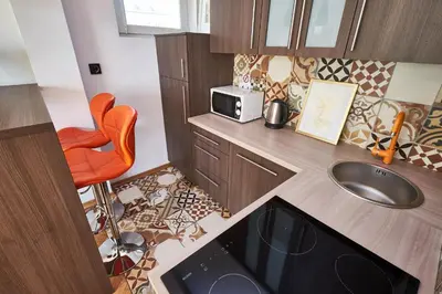 Kuchnia lub aneks kuchenny w obiekcie Noctis Apartment Tamka