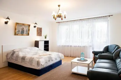 Łóżko lub łóżka w pokoju w obiekcie DOMOTEL Aleje Jerozolimskie