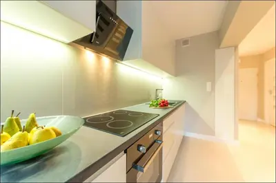 Kuchnia lub aneks kuchenny w obiekcie Chmielna Warsaw Cental Station P&O Serviced Apartments