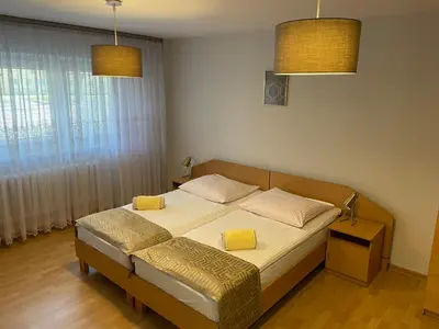 Łóżko lub łóżka w pokoju w obiekcie Pokoje Gościnne O-ES-HA