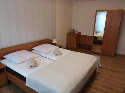 Łóżko lub łóżka w pokoju w obiekcie Pokoje Gościnne O-ES-HA