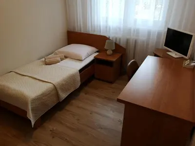 Łóżko lub łóżka w pokoju w obiekcie Pokoje Gościnne O-ES-HA