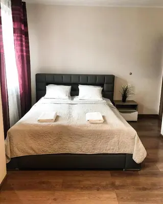 Łóżko lub łóżka w pokoju w obiekcie Senator Warsaw Apartments
