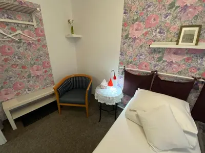 Łóżko lub łóżka w pokoju w obiekcie Kolorowa Guest Rooms