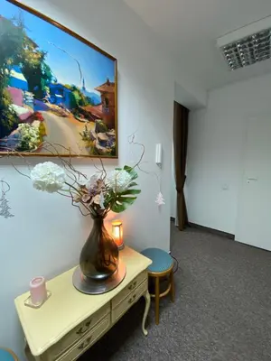Telewizja i/lub zestaw kina domowego w obiekcie Kolorowa Guest Rooms