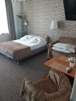 Łóżko lub łóżka w pokoju w obiekcie Kolorowa Guest Rooms