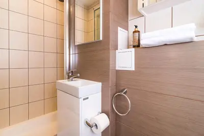 Łazienka w obiekcie Bagno 7 - Modern Apartment by Noclegi Renters