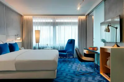 Łóżko lub łóżka w pokoju w obiekcie Renaissance Warsaw Airport Hotel