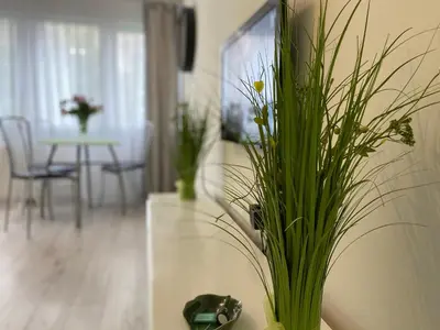 Telewizja i/lub zestaw kina domowego w obiekcie Good Time Apartments Warsaw City Center