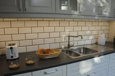 Kuchnia lub aneks kuchenny w obiekcie MiłoTu - Apartament Marszałkowski