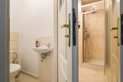 Łazienka w obiekcie Warm & Family Friendly Apartment with Balcony by Noclegi Renters