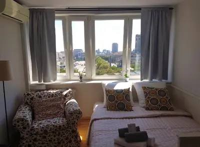 Łóżko lub łóżka w pokoju w obiekcie A.G-Apartamenty Warszawa Centrum