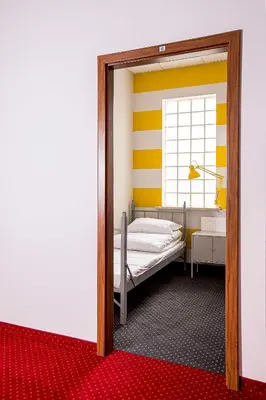 Łóżko lub łóżka w pokoju w obiekcie Inbed Hostel