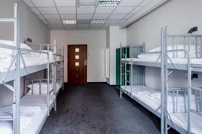 Łóżko lub łóżka w pokoju w obiekcie Inbed Hostel