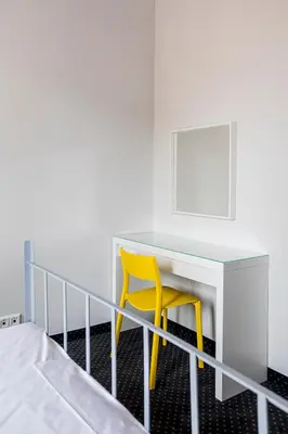 Łóżko lub łóżka w pokoju w obiekcie Inbed Hostel