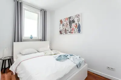 Łóżko lub łóżka w pokoju w obiekcie Chill Apartments Mokotow Business Park