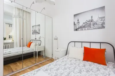 Łóżko lub łóżka w pokoju w obiekcie Sawa Apartment