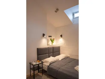 Łóżko lub łóżka w pokoju w obiekcie New World St Hostel