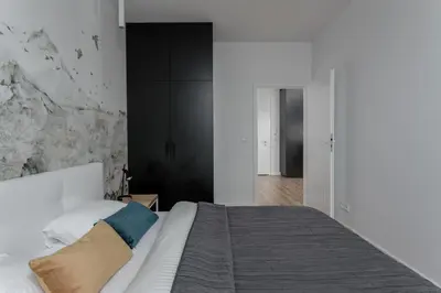 Łóżko lub łóżka w pokoju w obiekcie Chill Apartments Central Park