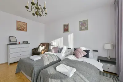 Łóżko lub łóżka w pokoju w obiekcie P&O Apartments Marconich 1 Wilanow