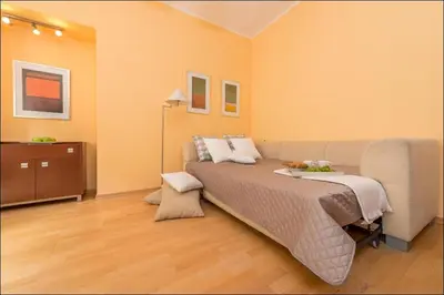 Łóżko lub łóżka w pokoju w obiekcie P&O Apartments Piwna