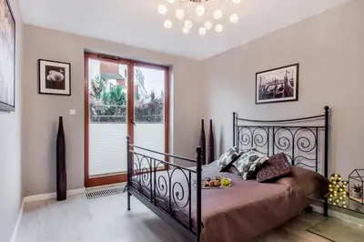 Łóżko lub łóżka w pokoju w obiekcie ClickTheFlat Luxury Apartment in Warsaw