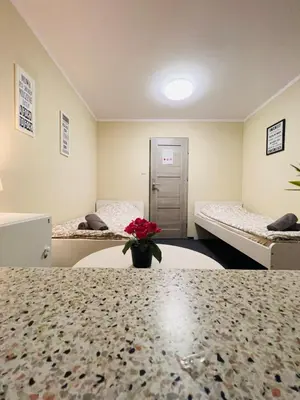Łóżko lub łóżka w pokoju w obiekcie Apart Rooms City Centre