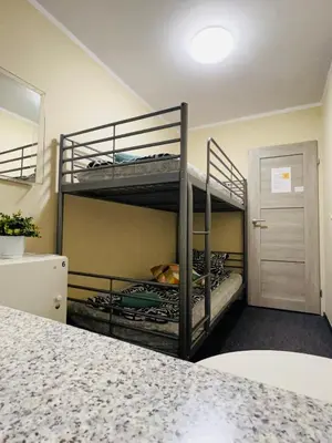 Łóżko lub łóżka w pokoju w obiekcie Apart Rooms City Centre