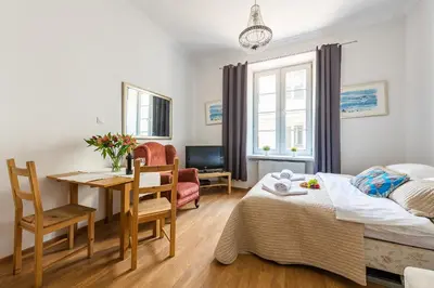 Łóżko lub łóżka w pokoju w obiekcie P&O Apartments Old Town